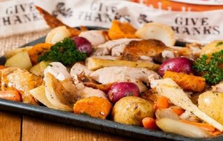roast turkey with root veggies and gravy